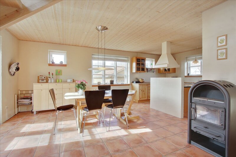 cozy kitchen with wood ceiling