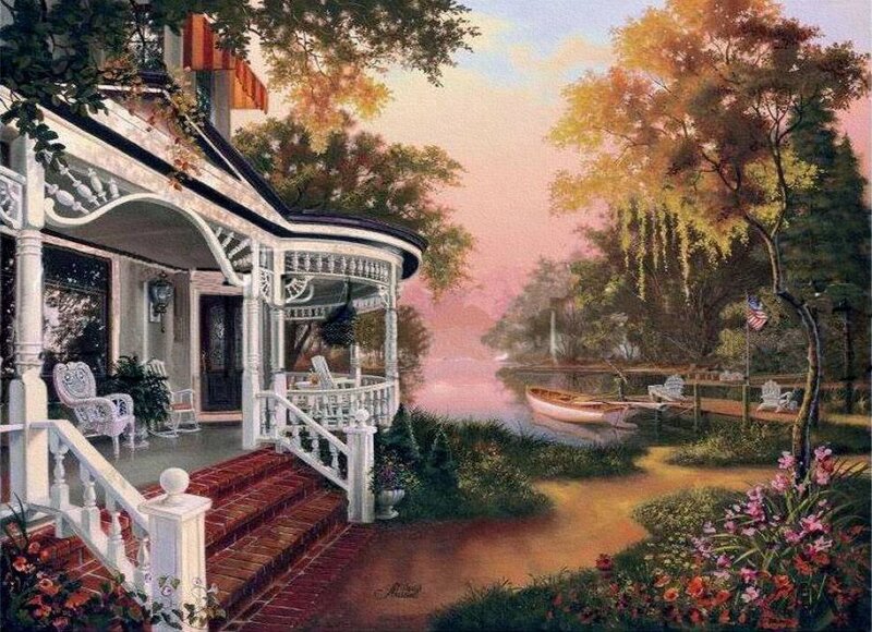 Cozy lakeside cottage at sunset