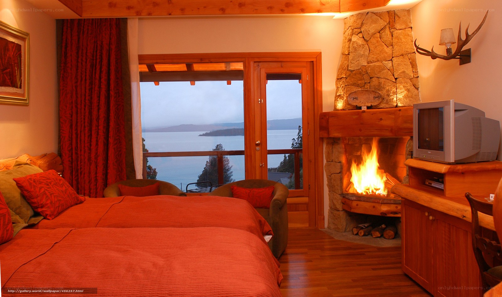 Cozy lakeview bedroom with fireplace