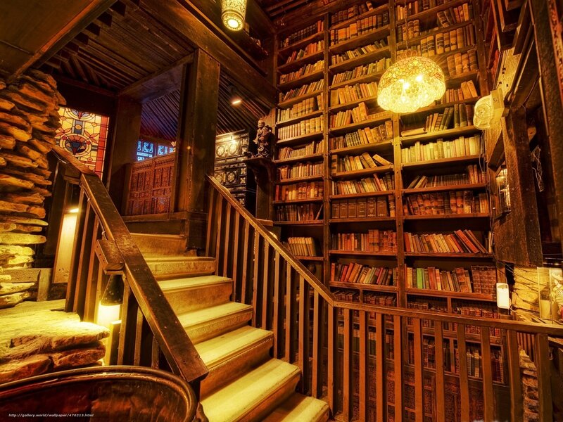 cozy library with wooden stairs