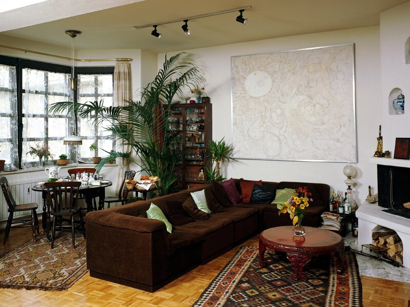 Cozy living room with brown sofa