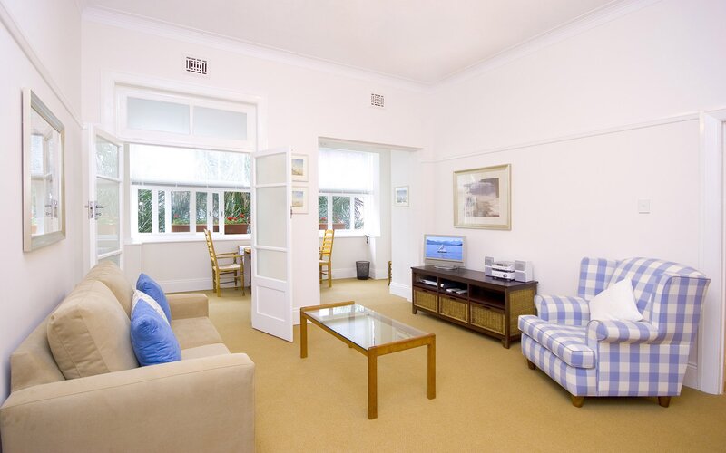 Cozy living room with checkered armchair