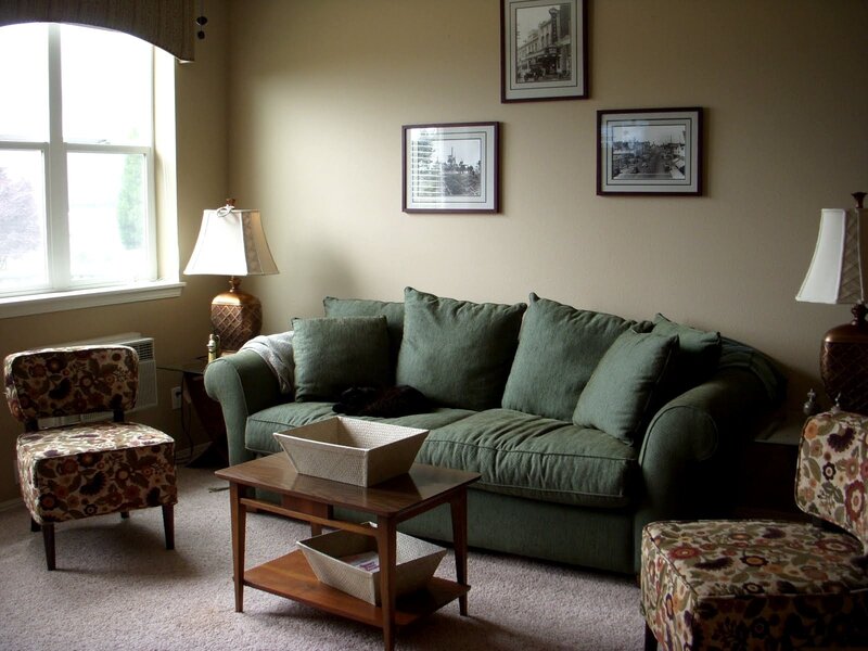 cozy living room with green sofa