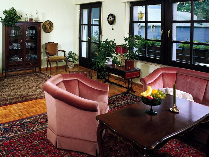 Cozy living room with pink furniture