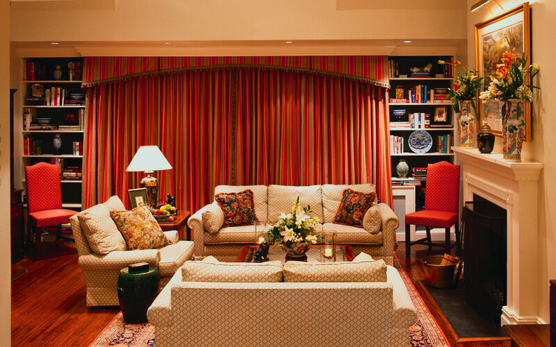 Cozy living room with red curtains