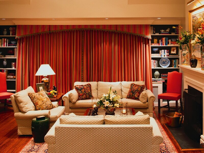 Cozy living room with red curtains