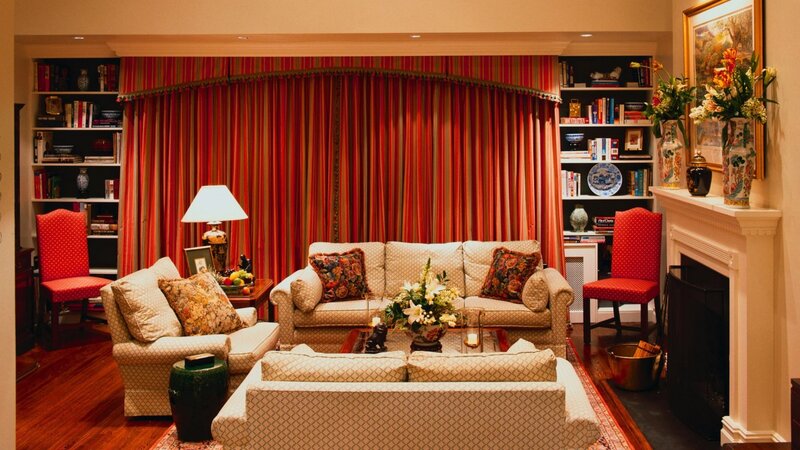 cozy living room with red curtains