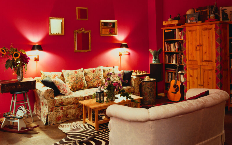 Cozy living room with red walls