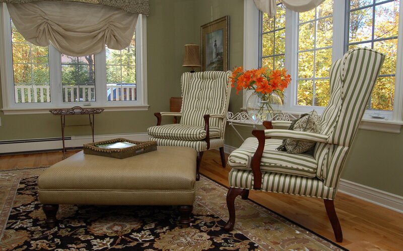 Cozy living room with striped chairs