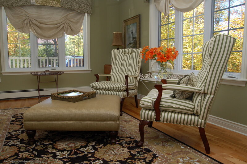 Cozy living room with striped chairs