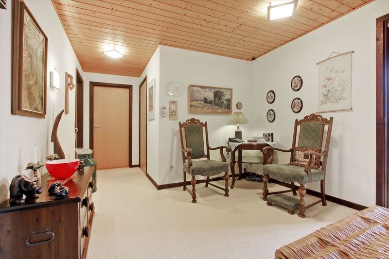 cozy living room with wooden ceiling