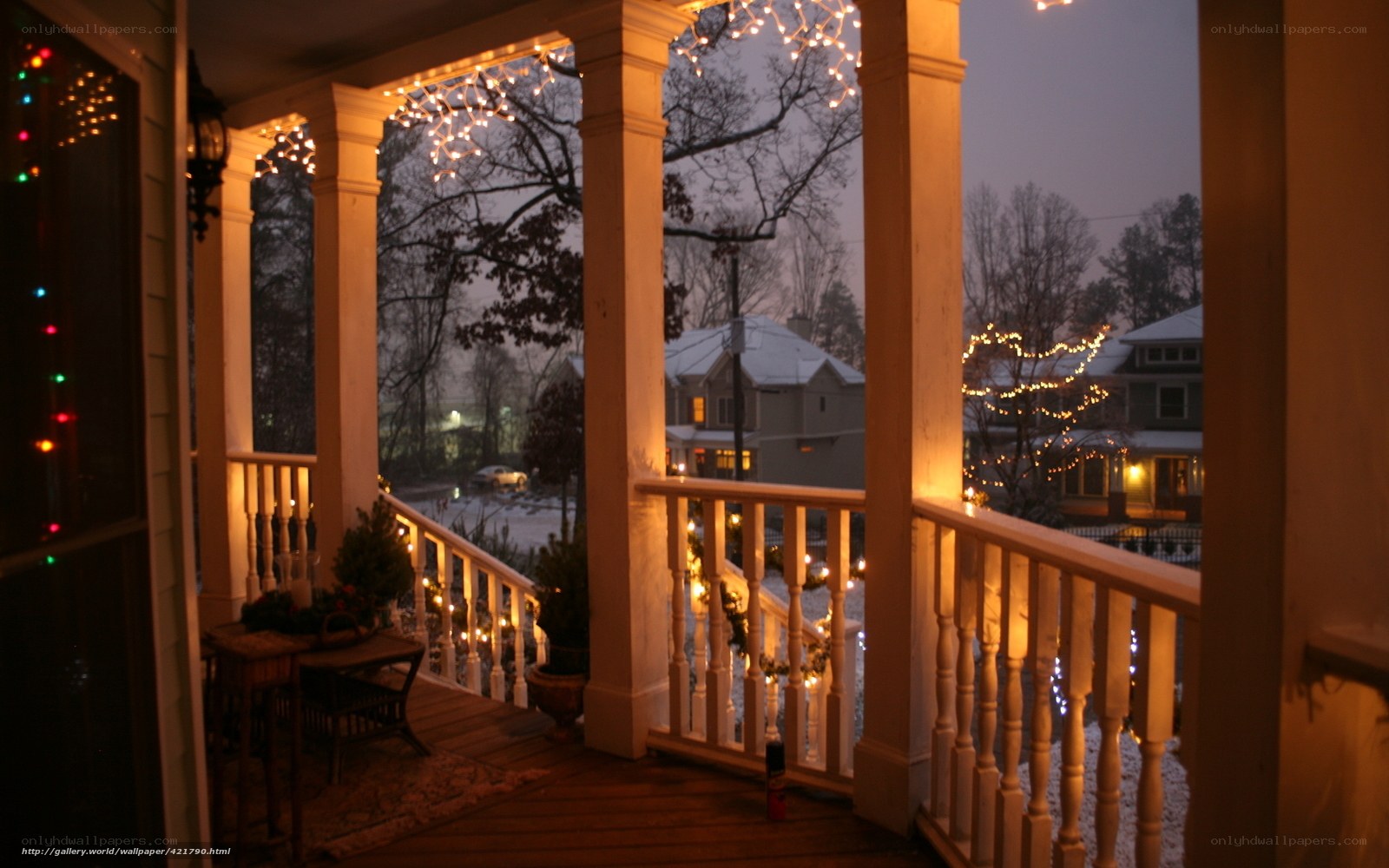 Cozy porch at dusk with lights