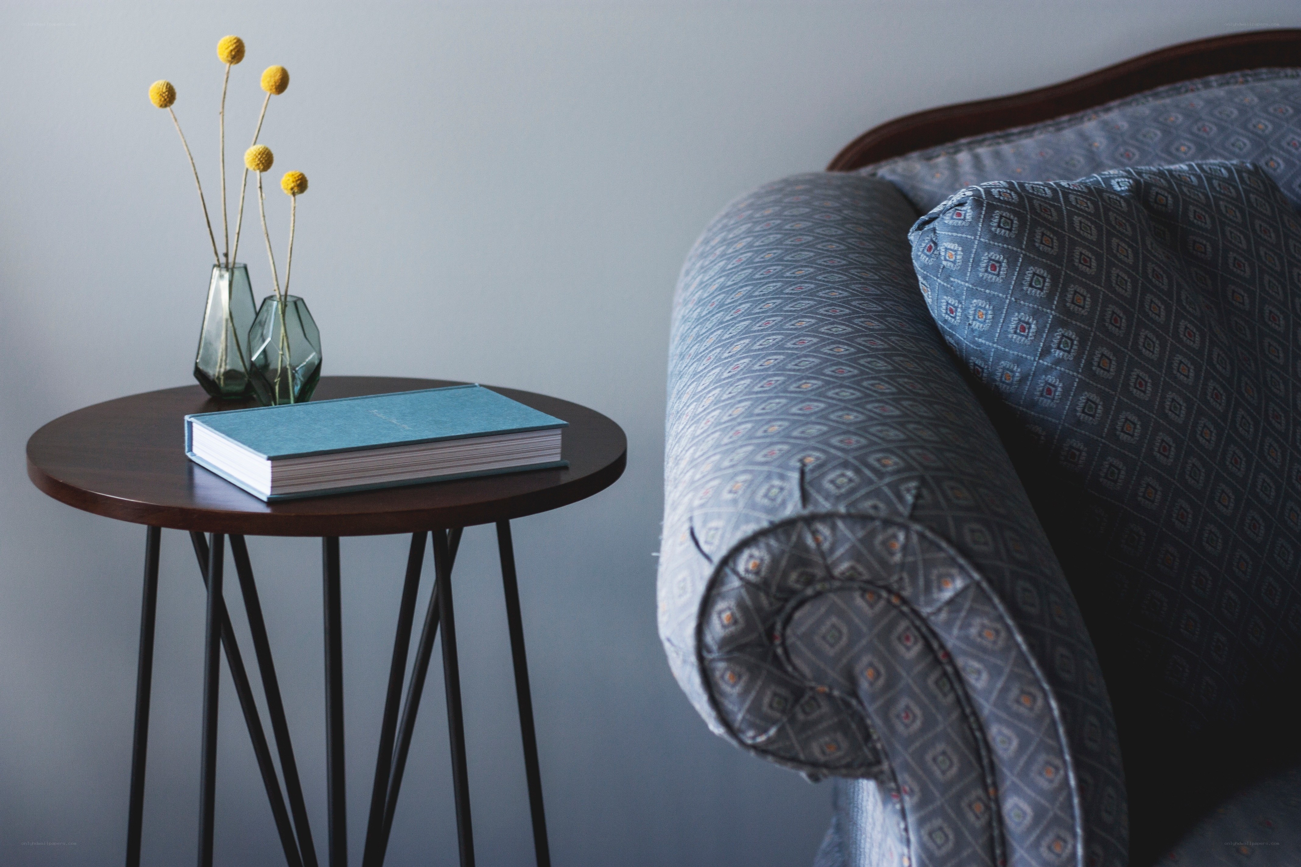 Cozy reading nook with book and flowers