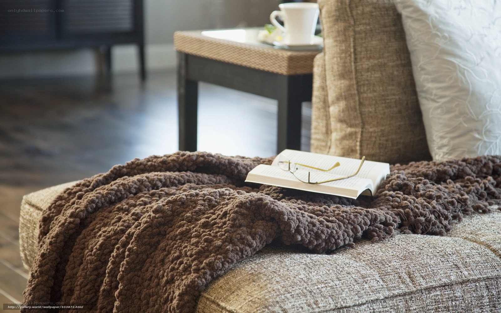 Cozy reading nook with book and glasses