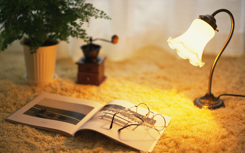 Cozy reading nook with lamp