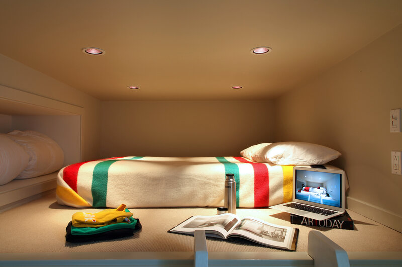 Cozy sleeping nook with laptop