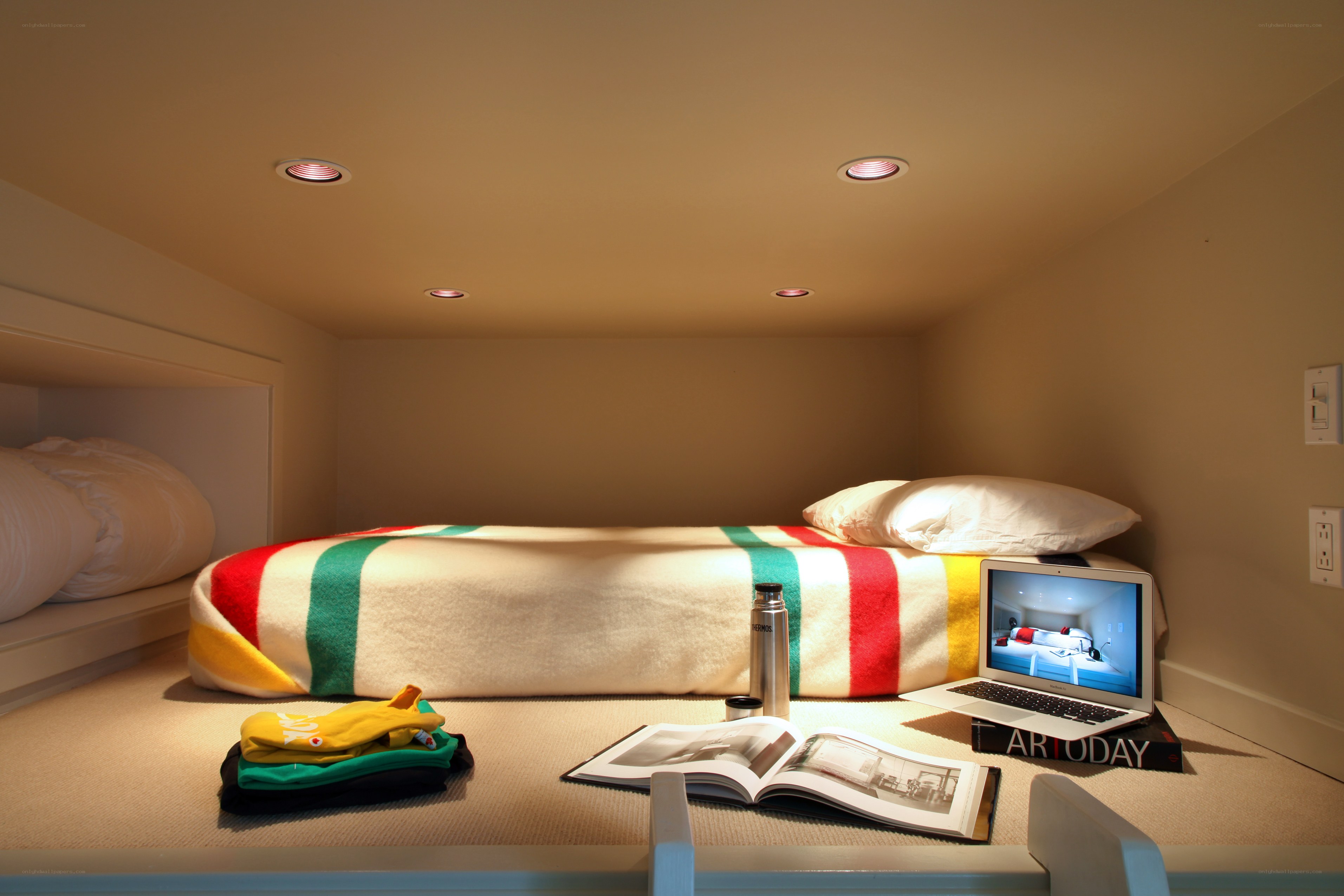 Cozy sleeping nook with laptop