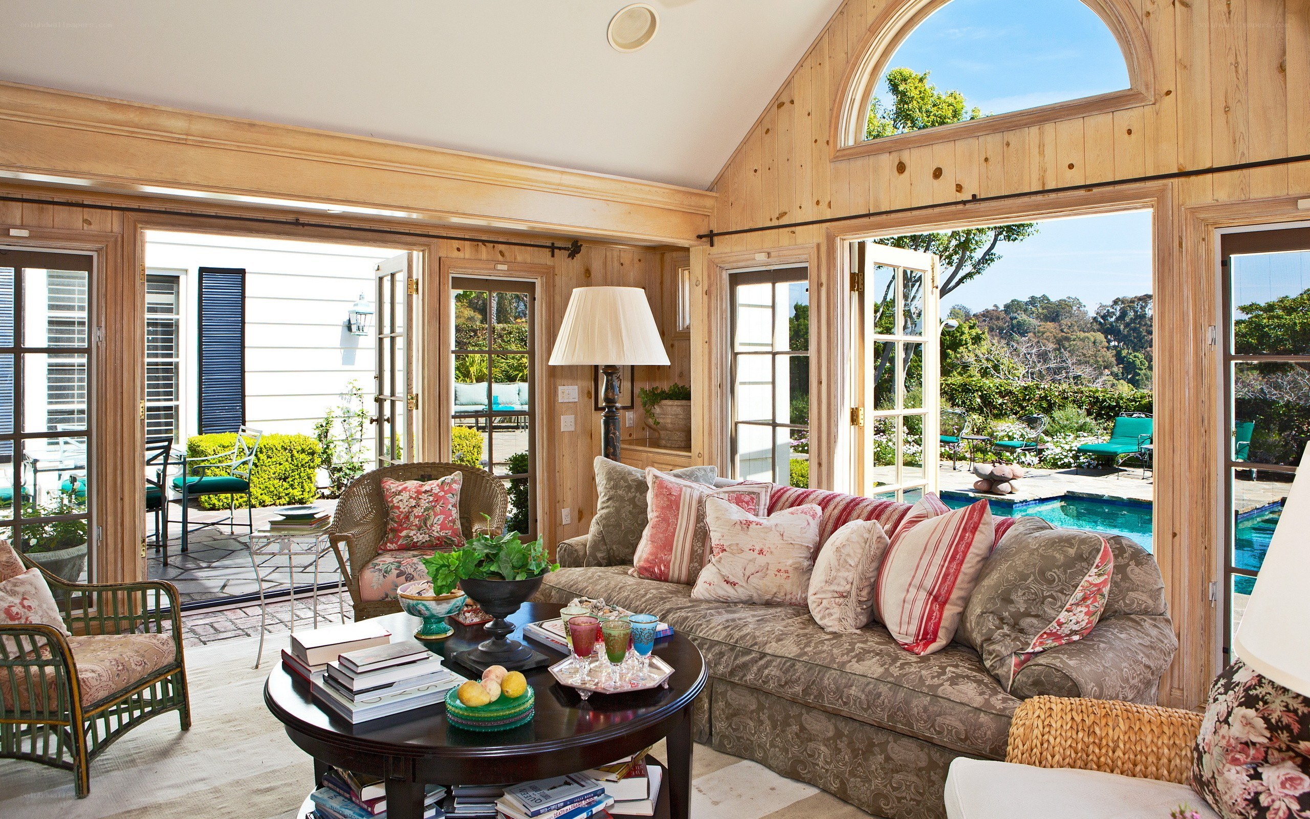 Cozy sunroom with pool view