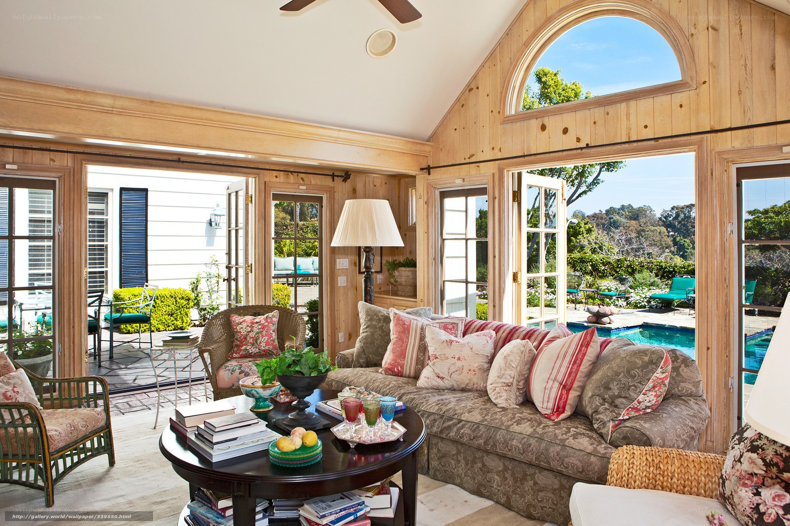 Cozy sunroom with pool view