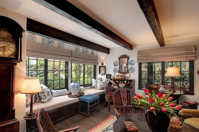 cozy sunroom with wooden beams
