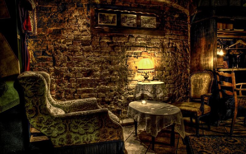 cozy vintage room with stone walls