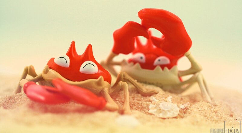 Crab Figurines on Sand