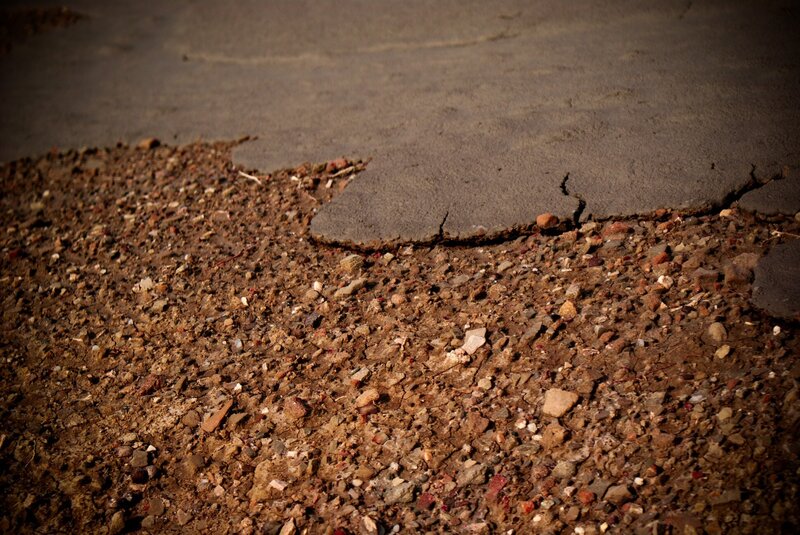 cracked asphalt pavement