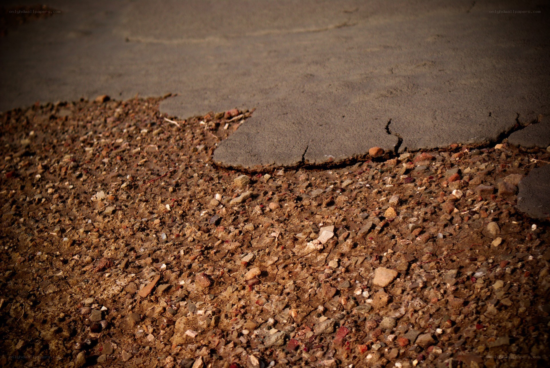 cracked asphalt pavement
