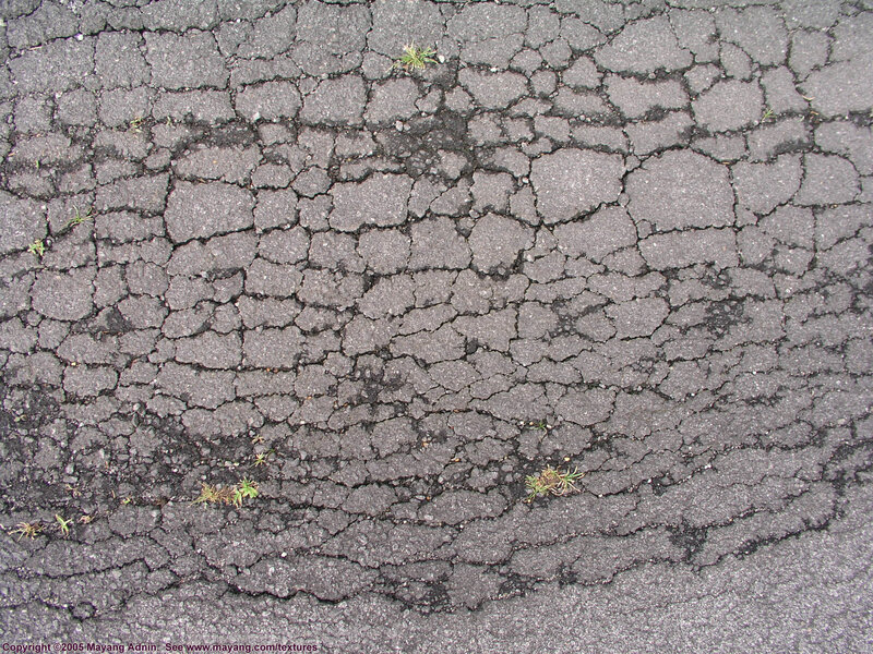 cracked asphalt surface