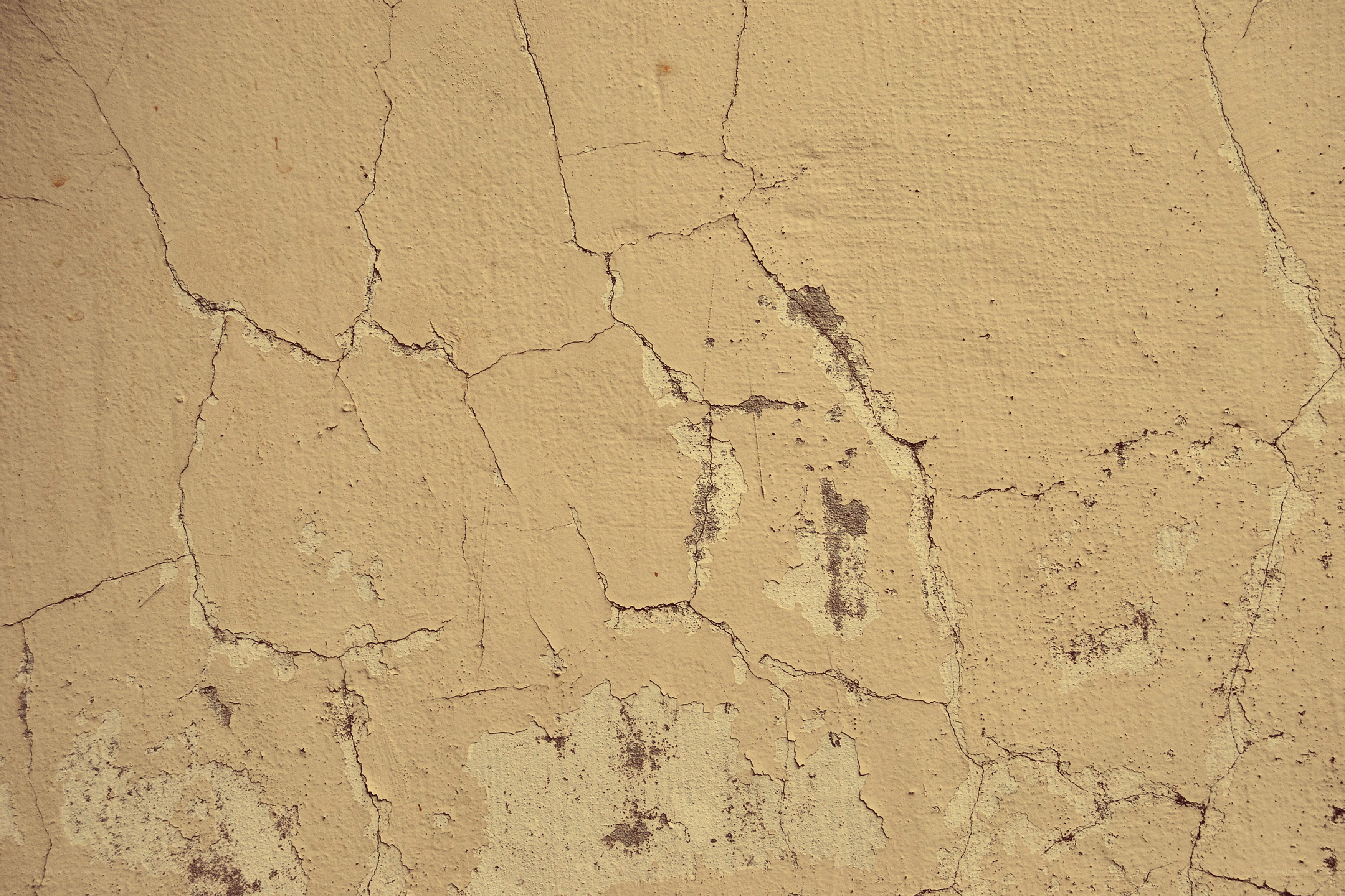 cracked beige wall texture