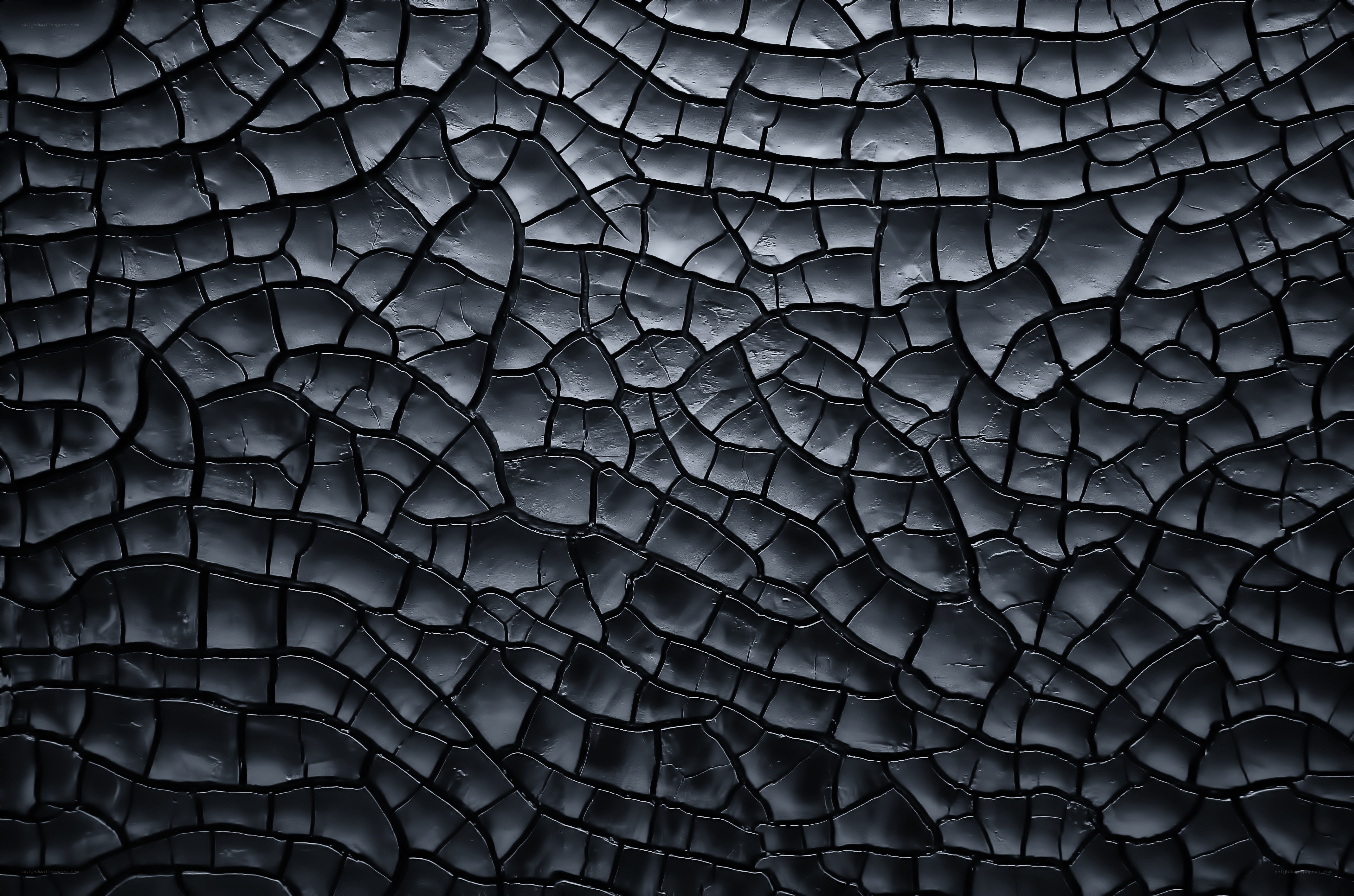 cracked black surface texture