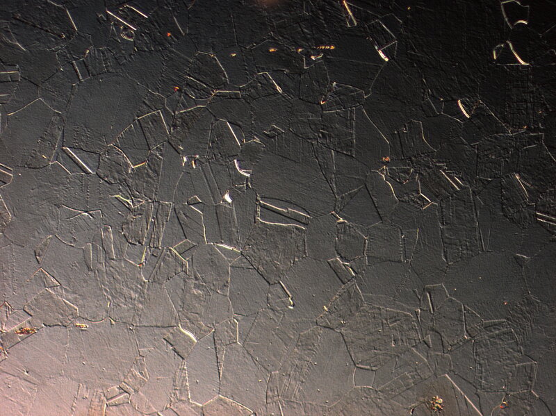 cracked black surface texture