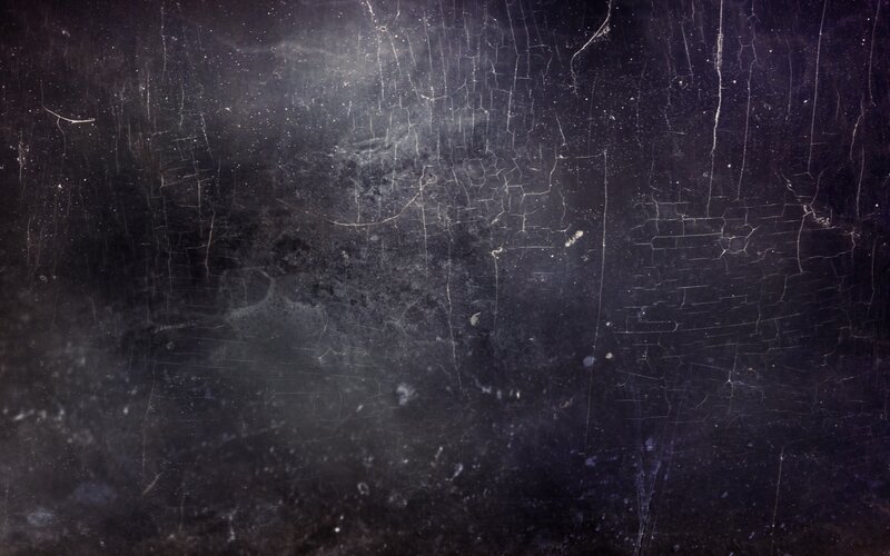 cracked black surface texture