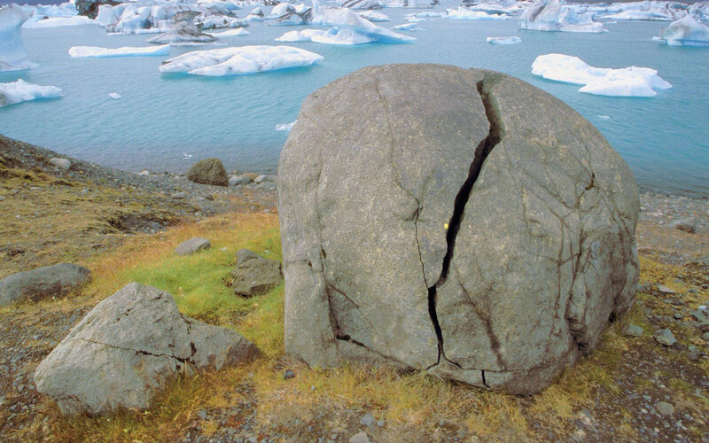 Cracked boulder near glacier lagoon