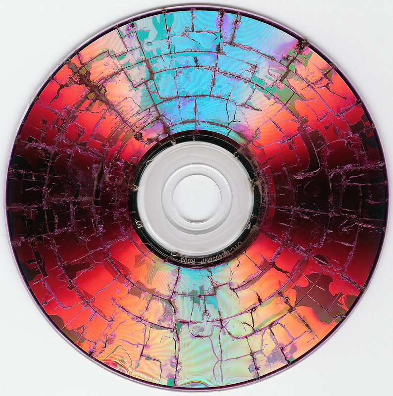 cracked cd with iridescent surface