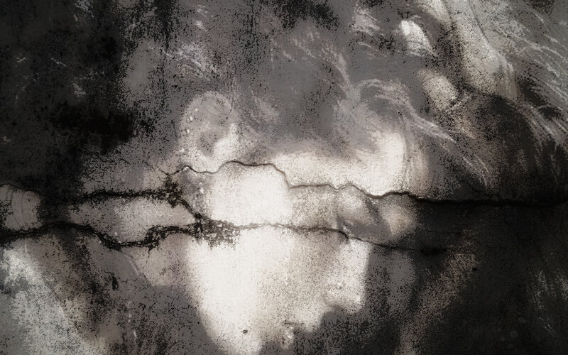 Cracked Concrete Surface — Black