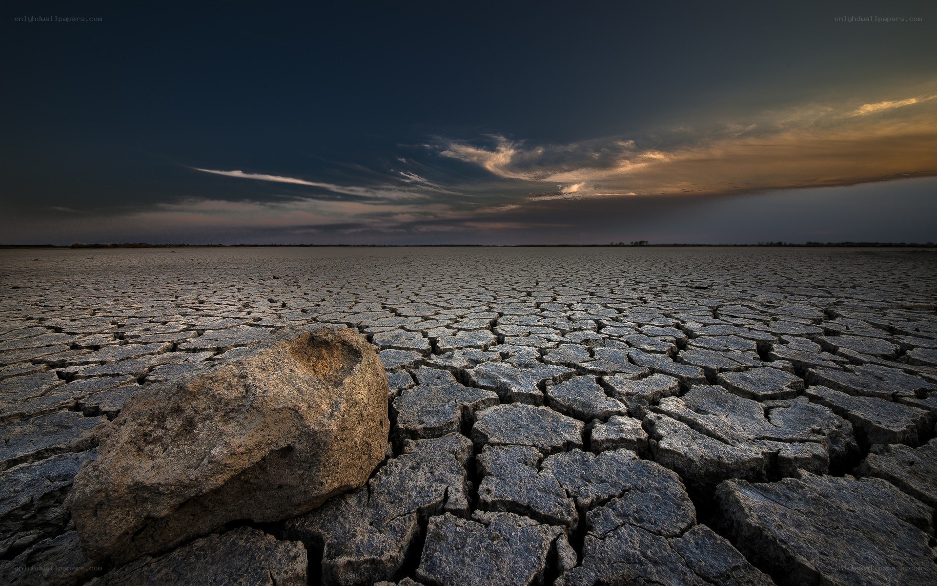 cracked earth at sunset