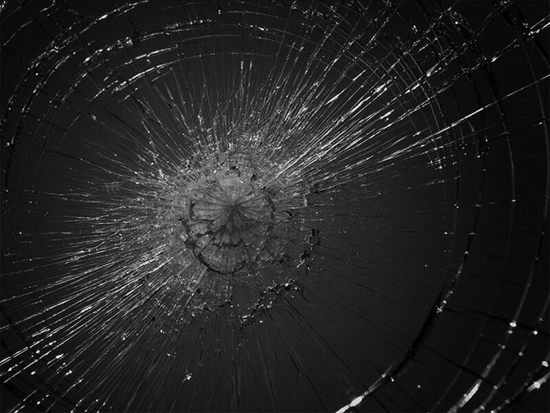 Cracked Glass Surface — Black, Dramatic, Photograph, Cracks, Impact Point