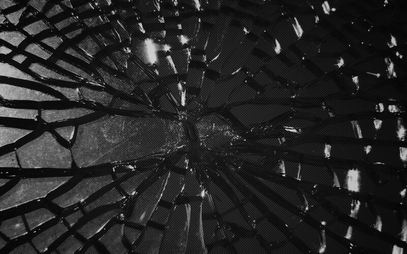 Cracked Glass Surface — Black, Dramatic, Photograph, Cracks, Shards, Light Reflections