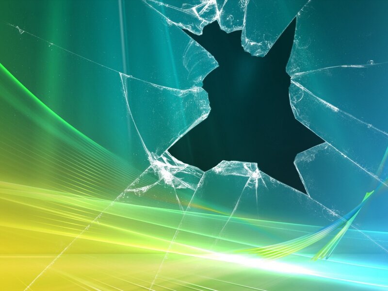 cracked glass with green and yellow light