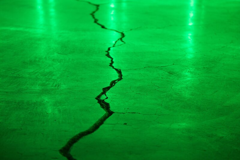 cracked green floor surface