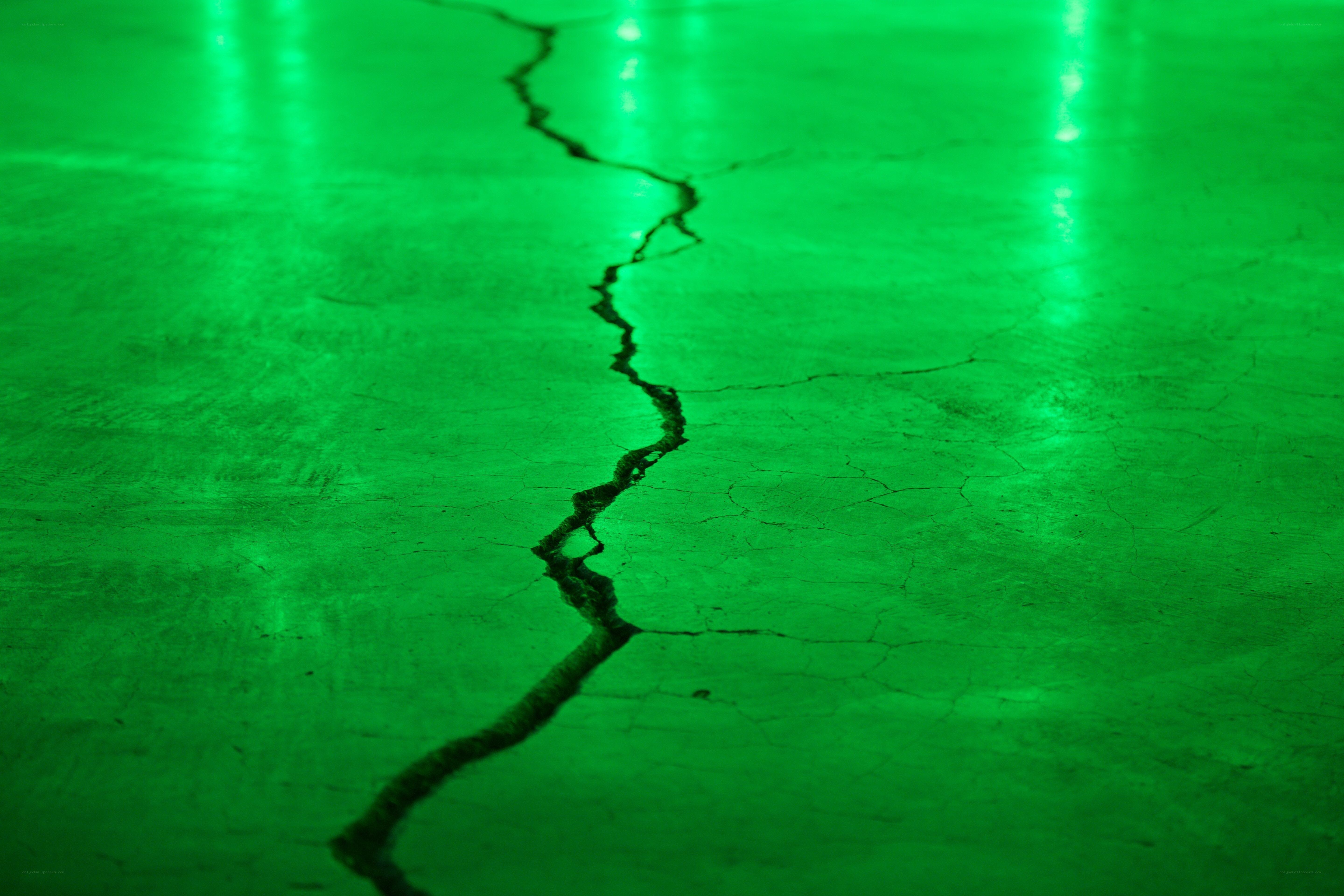 cracked green floor surface