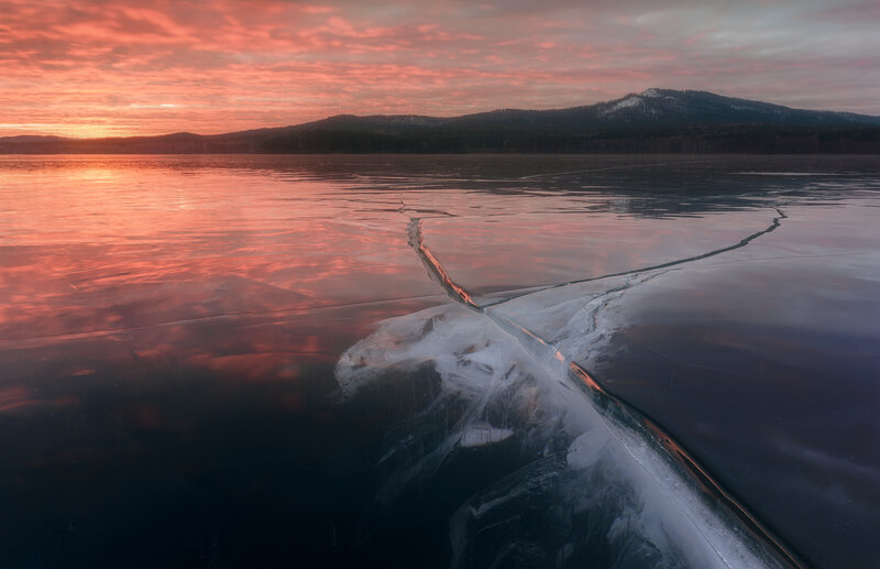 Cracked Ice on Lake — Red