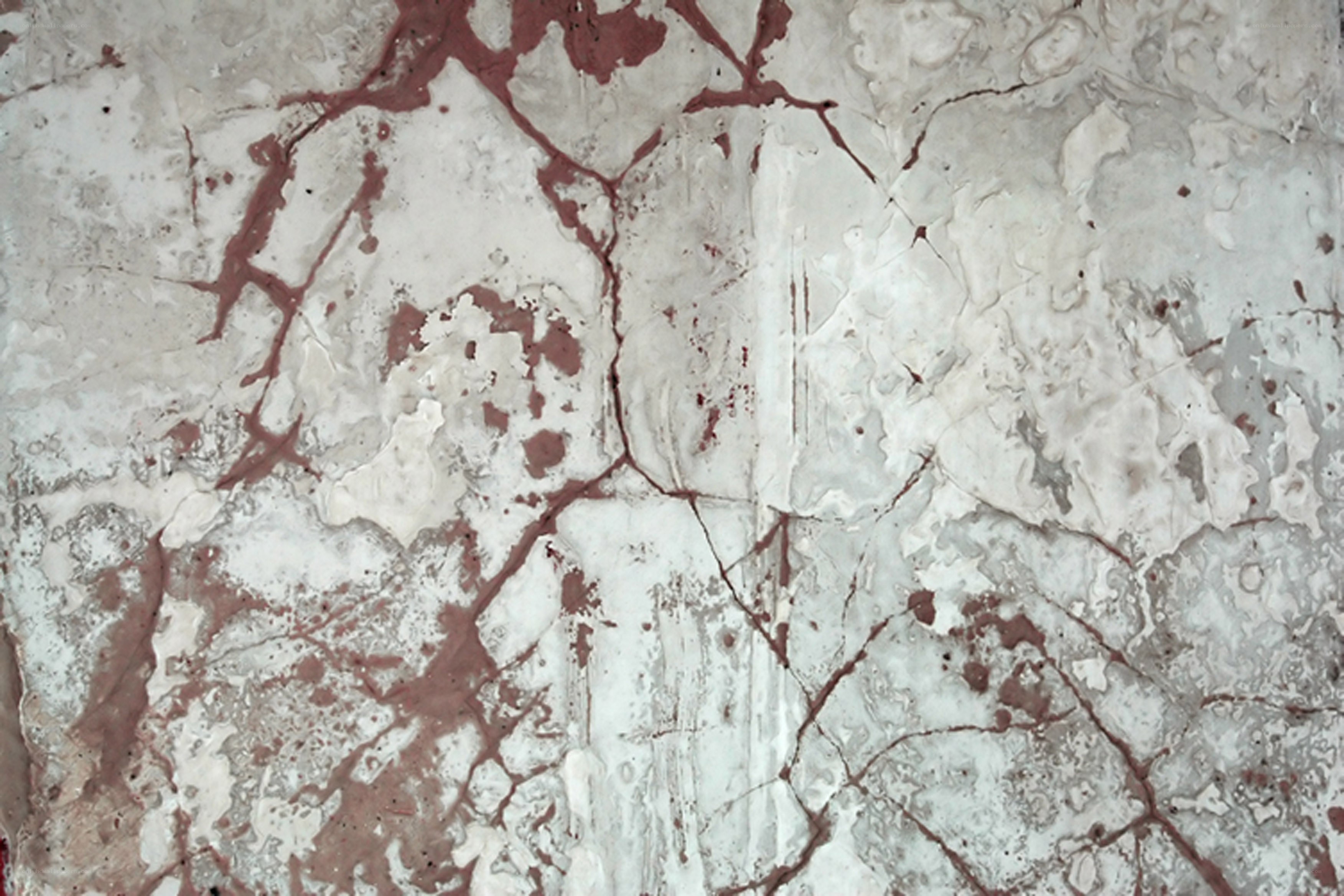cracked marble surface with red veins