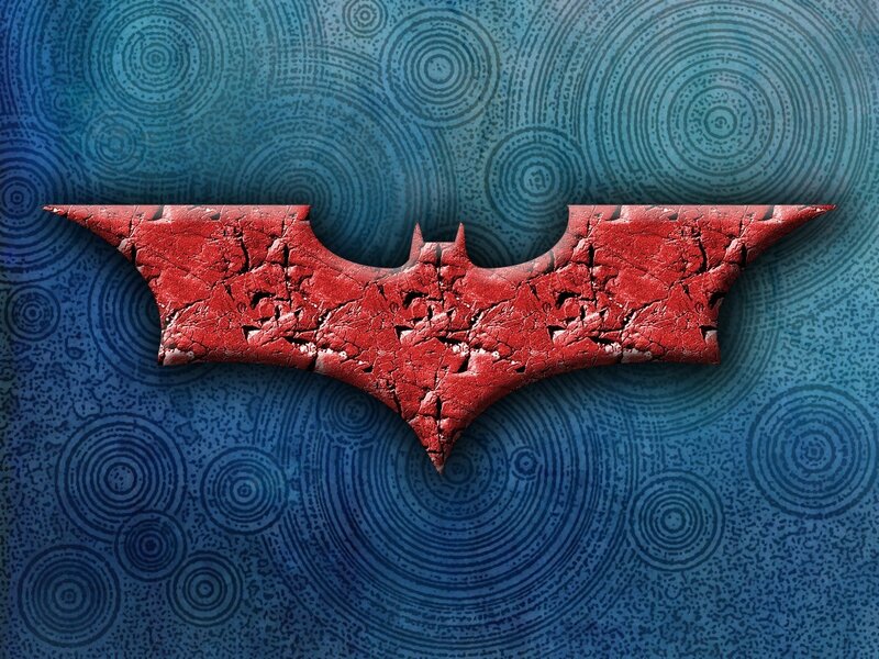 cracked red bat symbol
