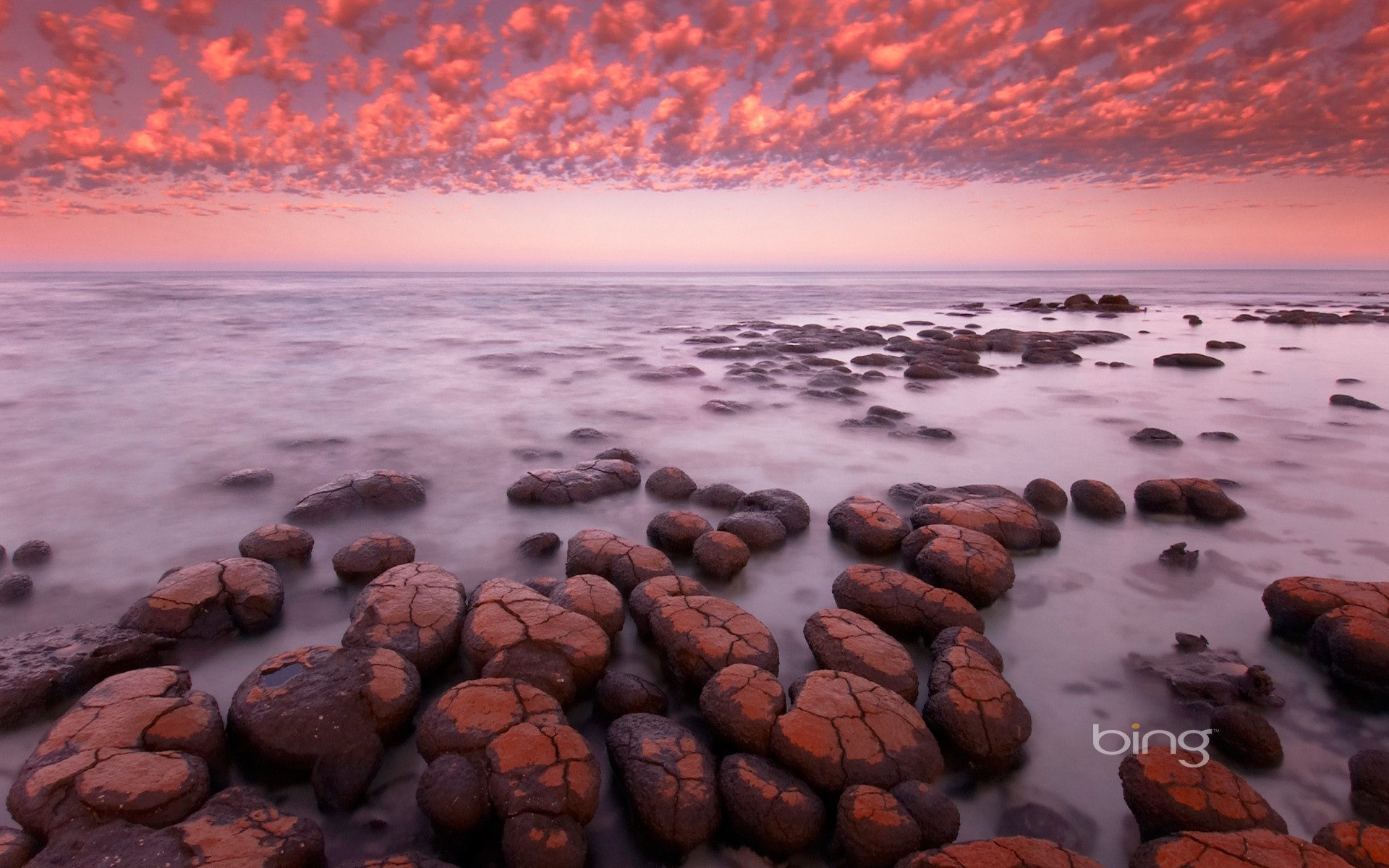 cracked rocks at sunset