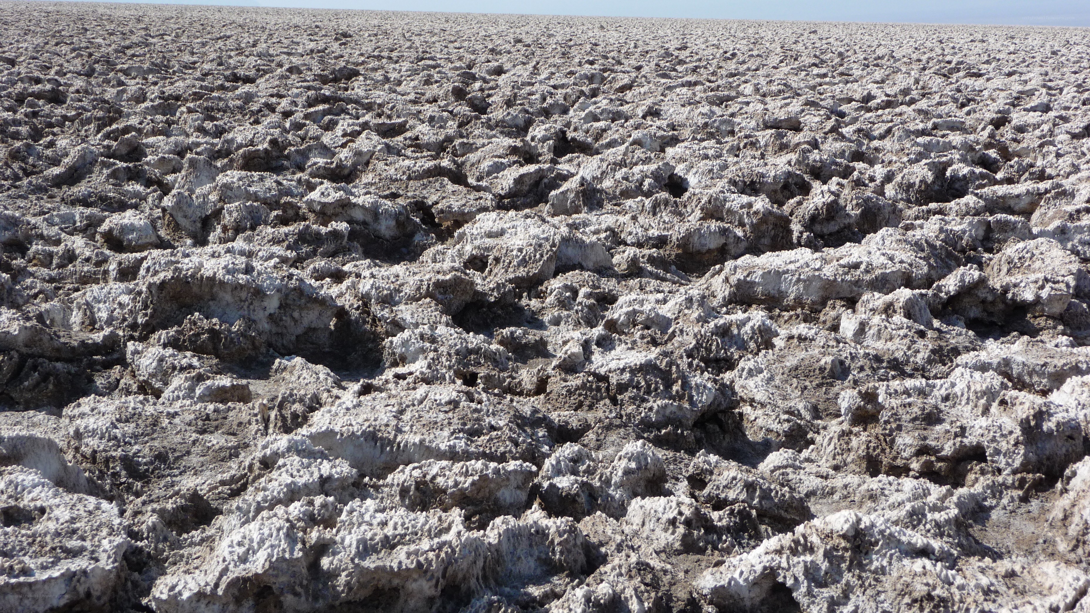 cracked salt flat landscape