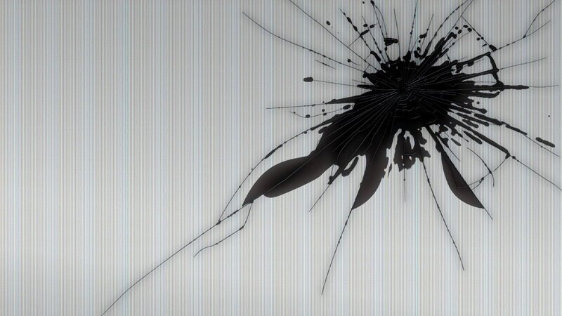 cracked screen with impact damage