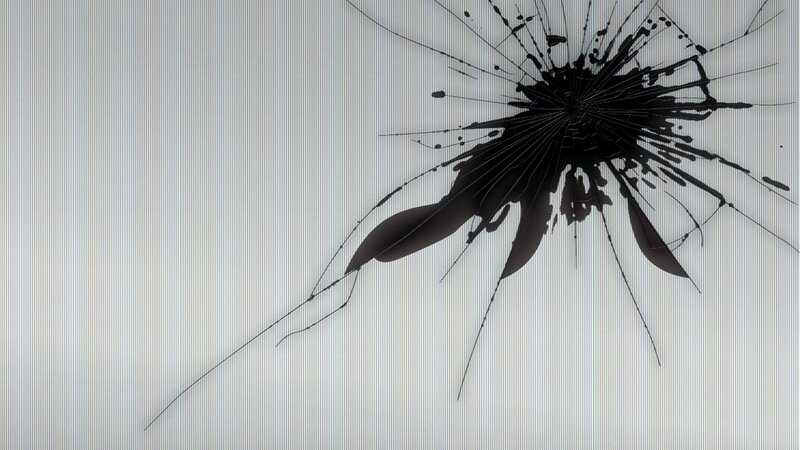 cracked screen with impact mark