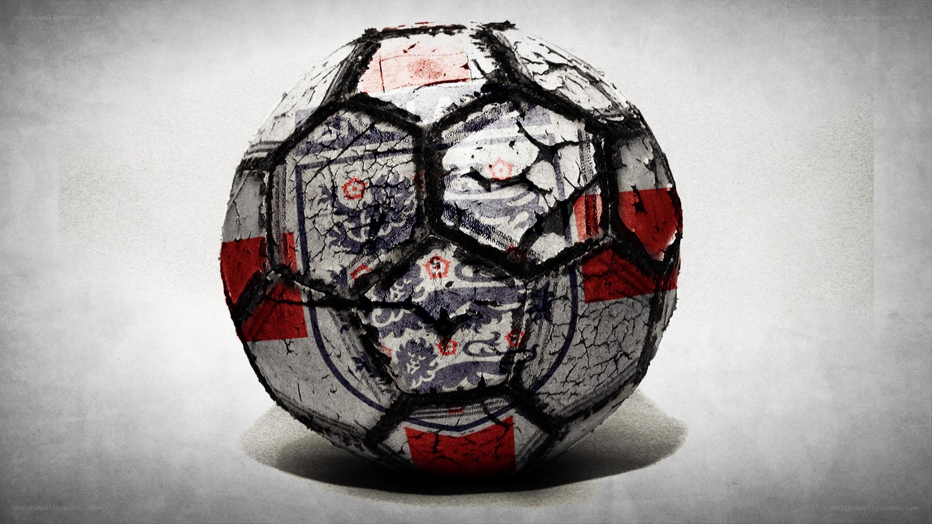 cracked soccer ball with flag design